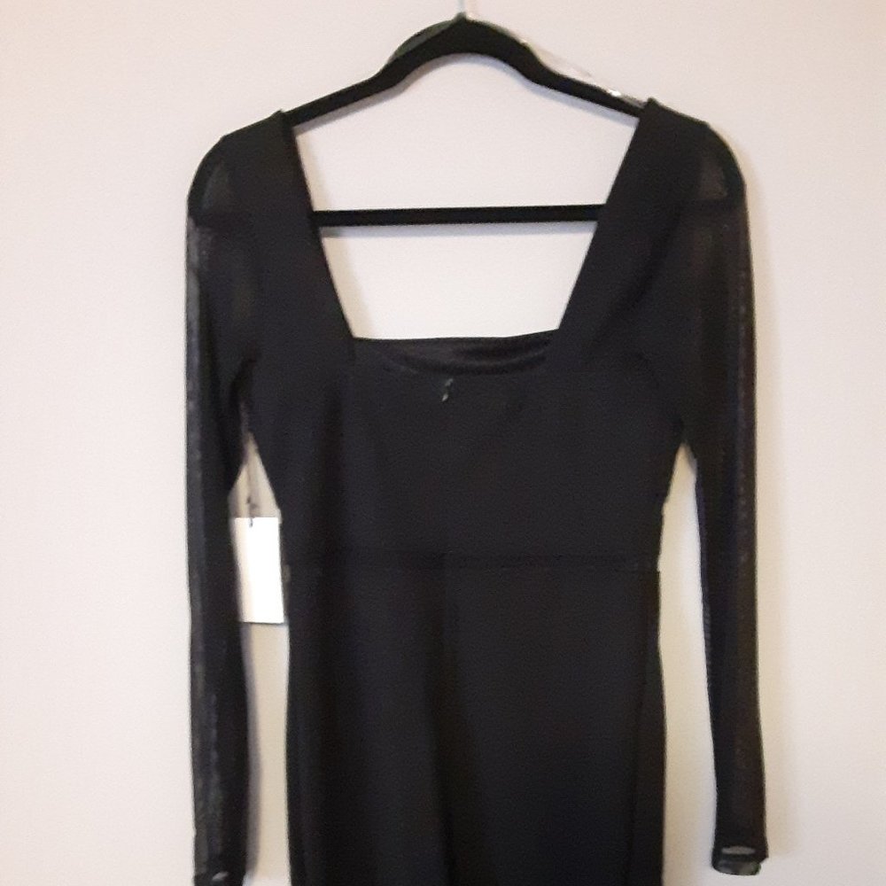 Iris size med. Fitted Black Mini Dress